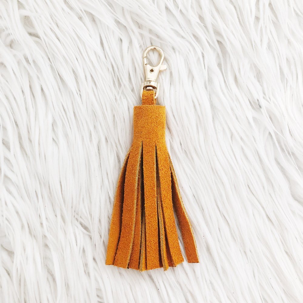 tangerine suede tassel keychain & custom tag – shop kendra beshk