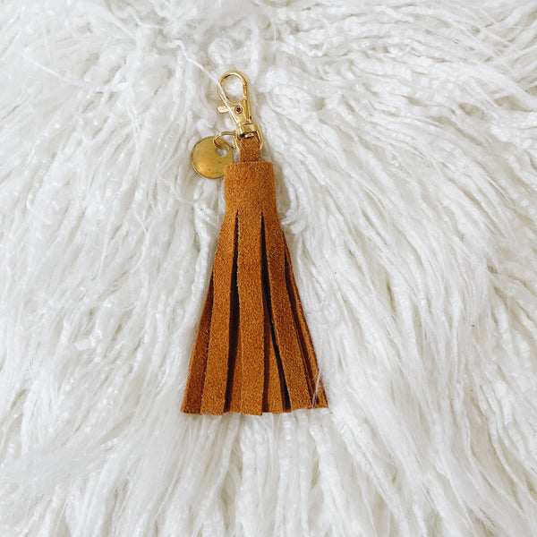 rust suede tassel keychain & custom tag – shop kendra beshk